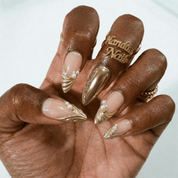 Bronze Radiance press-on nails worn on hand – almond shape by Handora