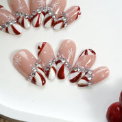 Candy Glam press-on nails worn on hand – almond shape by Handora