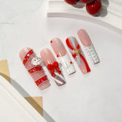 Candy Snow press-on nails worn on hand – square shape by Handora