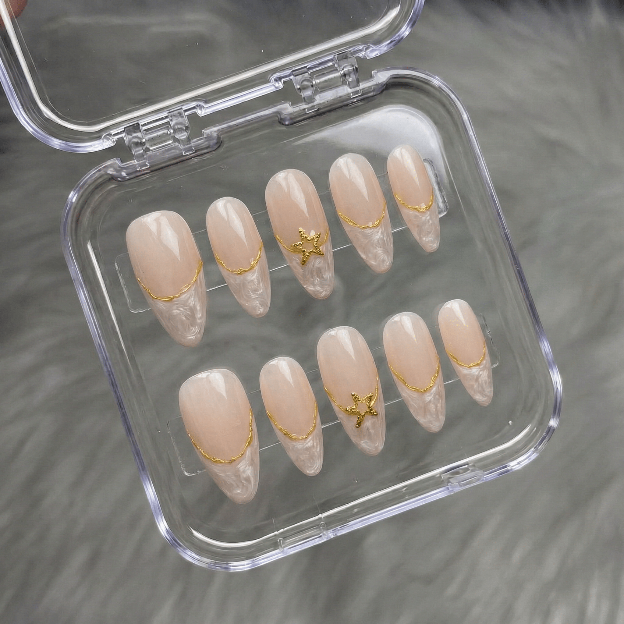 Celestial Marble press-on nails – hand-painted reusable gel set by Handora