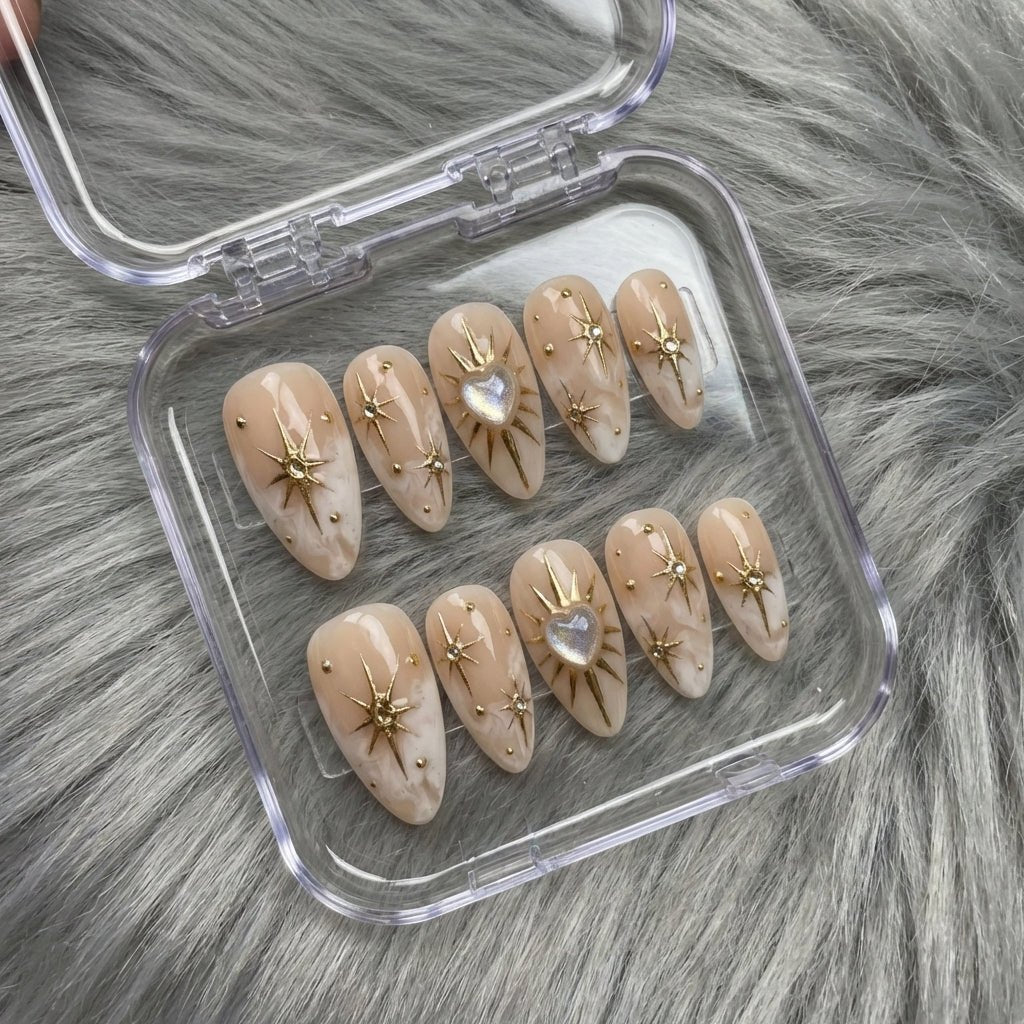Celestial Nude press-on nails worn on hand – almond shape by Handora