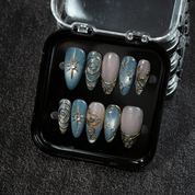 Celestial Swirl press-on nails – hand-painted reusable gel set by Handora