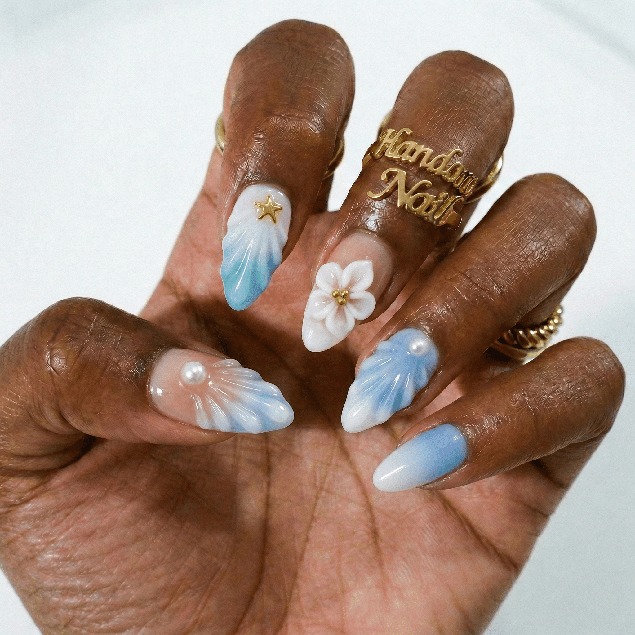 Celestial Tide press-on nails – hand-painted reusable gel set by Handora