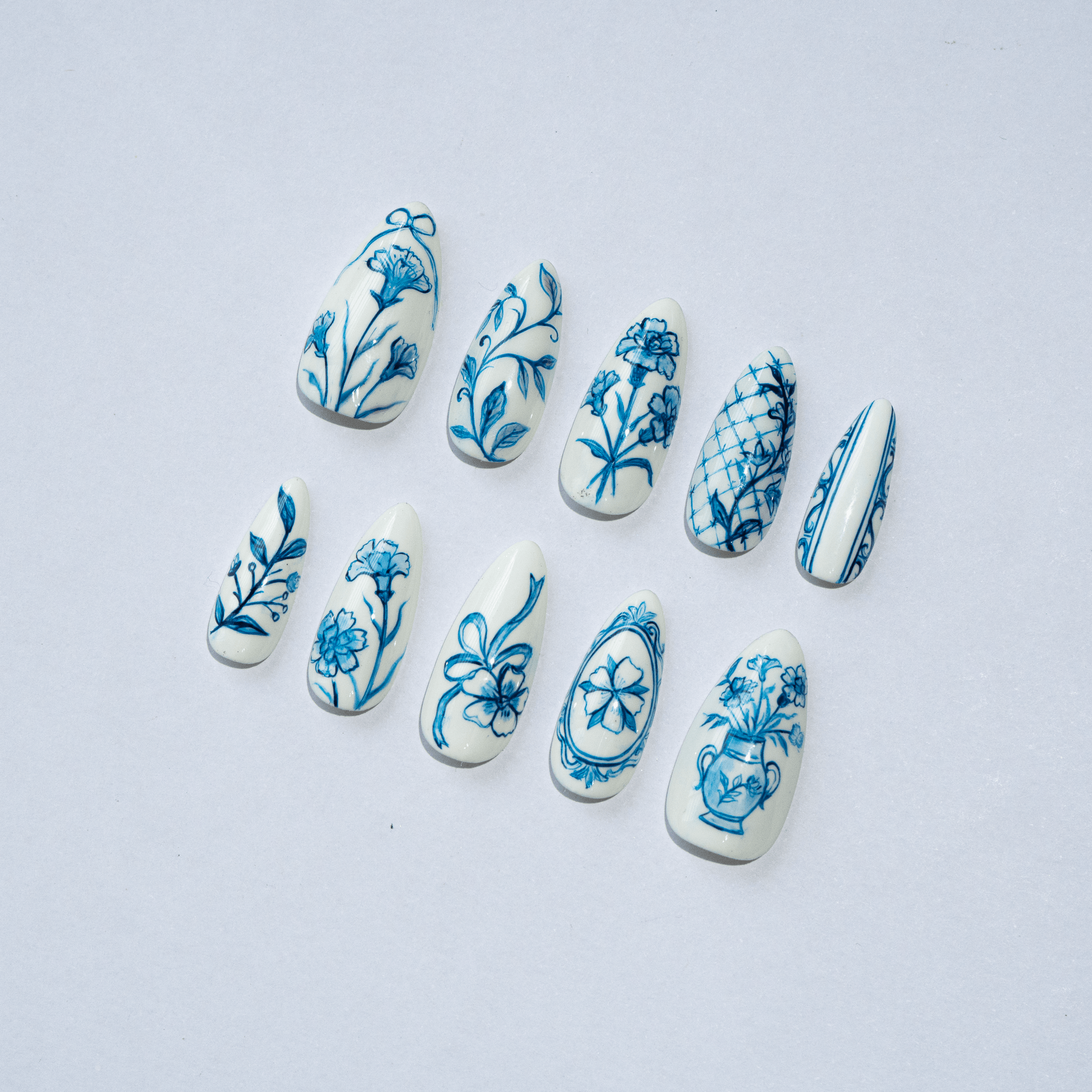 Ceramic Flora press-on nails – design close-up by Handora