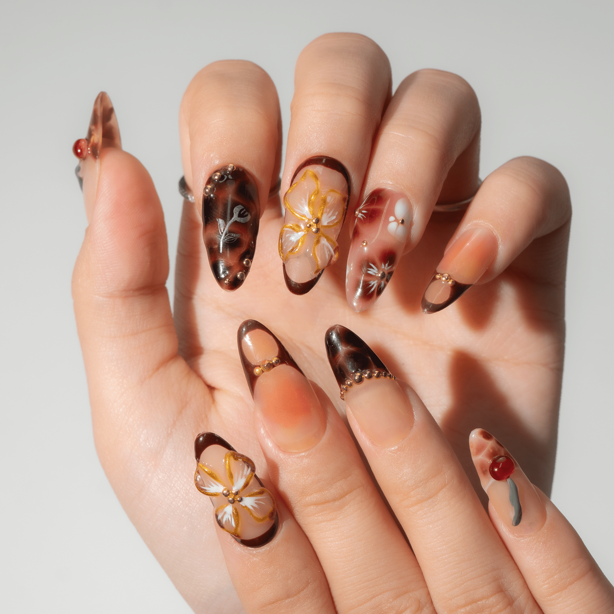Cherry Bloom press-on nails – hand-painted reusable gel set by Handora