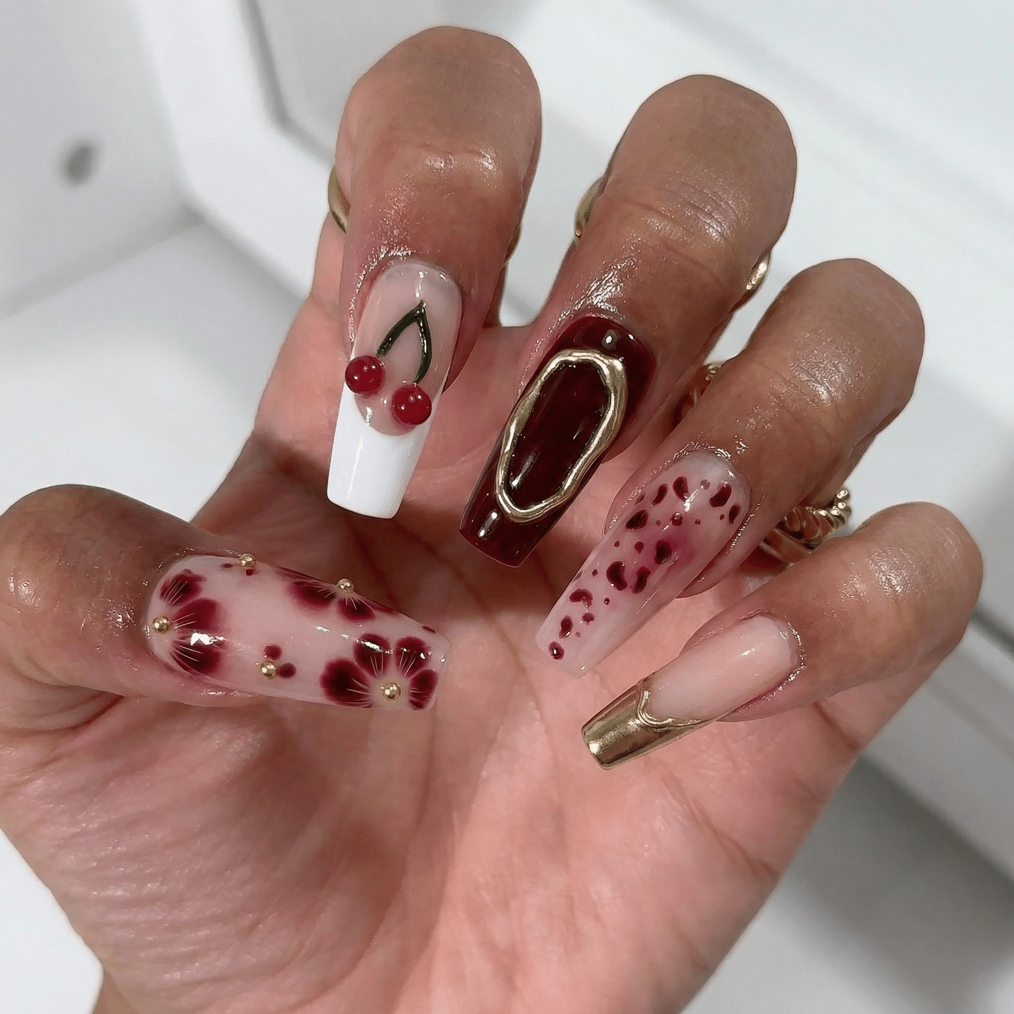 Cherry Crimson press-on nails – hand-painted reusable gel set by Handora