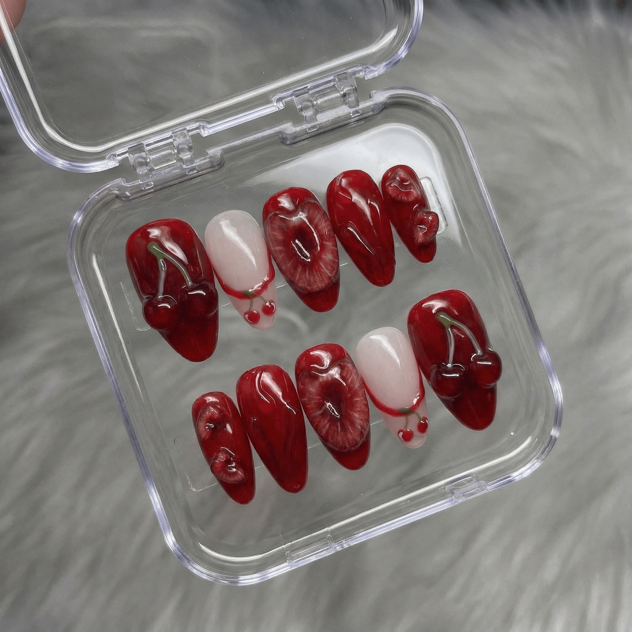 Cherry Crush red press-on nails by Handora