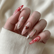 Cherry Spark press-on nails – hand-painted reusable gel set by Handora