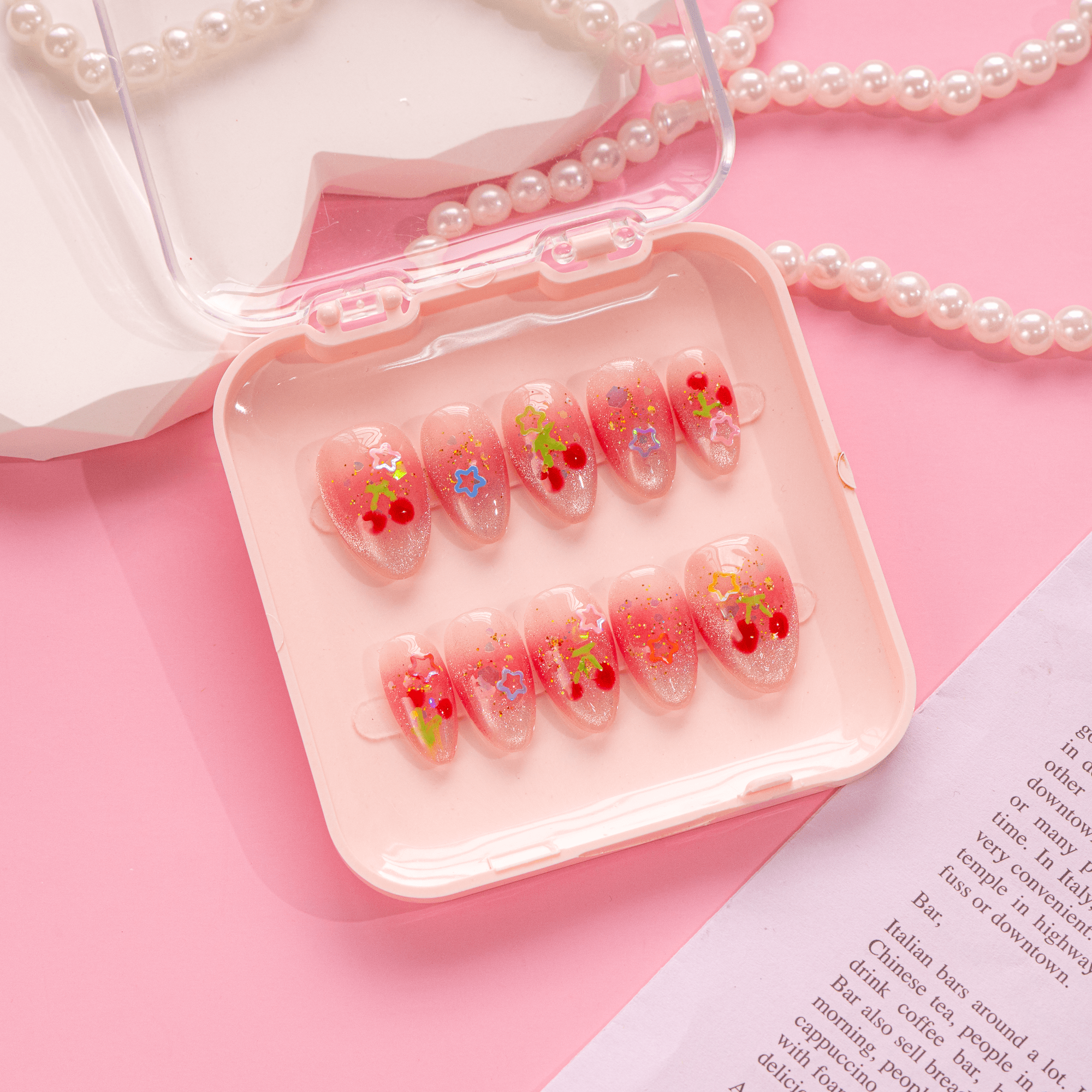 Cherry Starlet press-on nails – design close-up by Handora