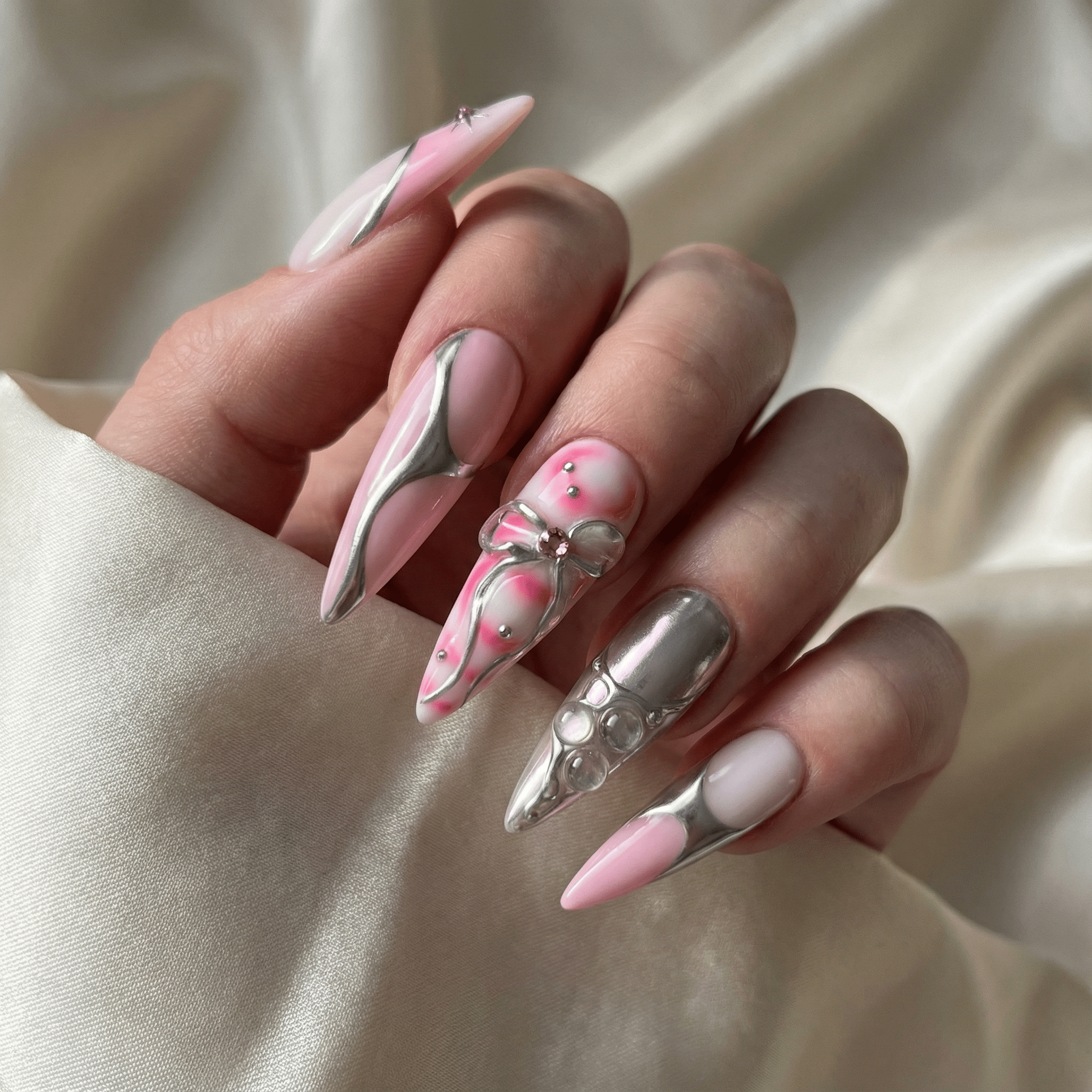 Chrome Coquette press-on nails – hand-painted reusable gel set by Handora