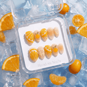 Citrus Drop press-on nails – hand-painted reusable gel set by Handora