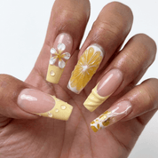Citrus Plumeria press-on nails – hand-painted reusable gel set by Handora
