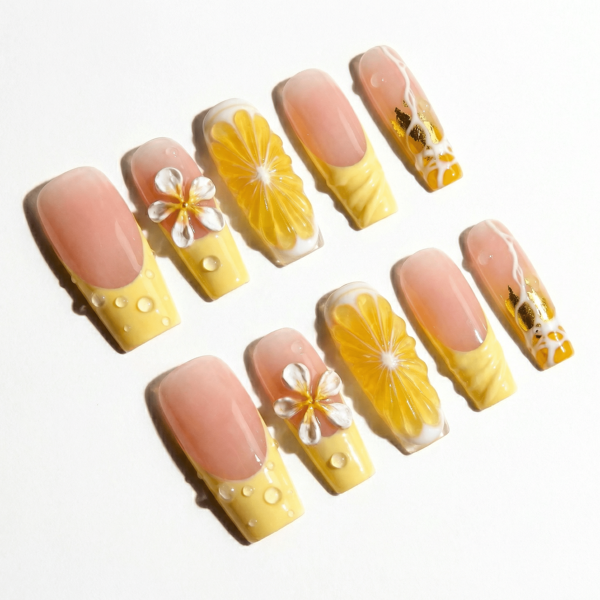 Citrus Plumeria floral nail design – handmade press-on nails by Handora