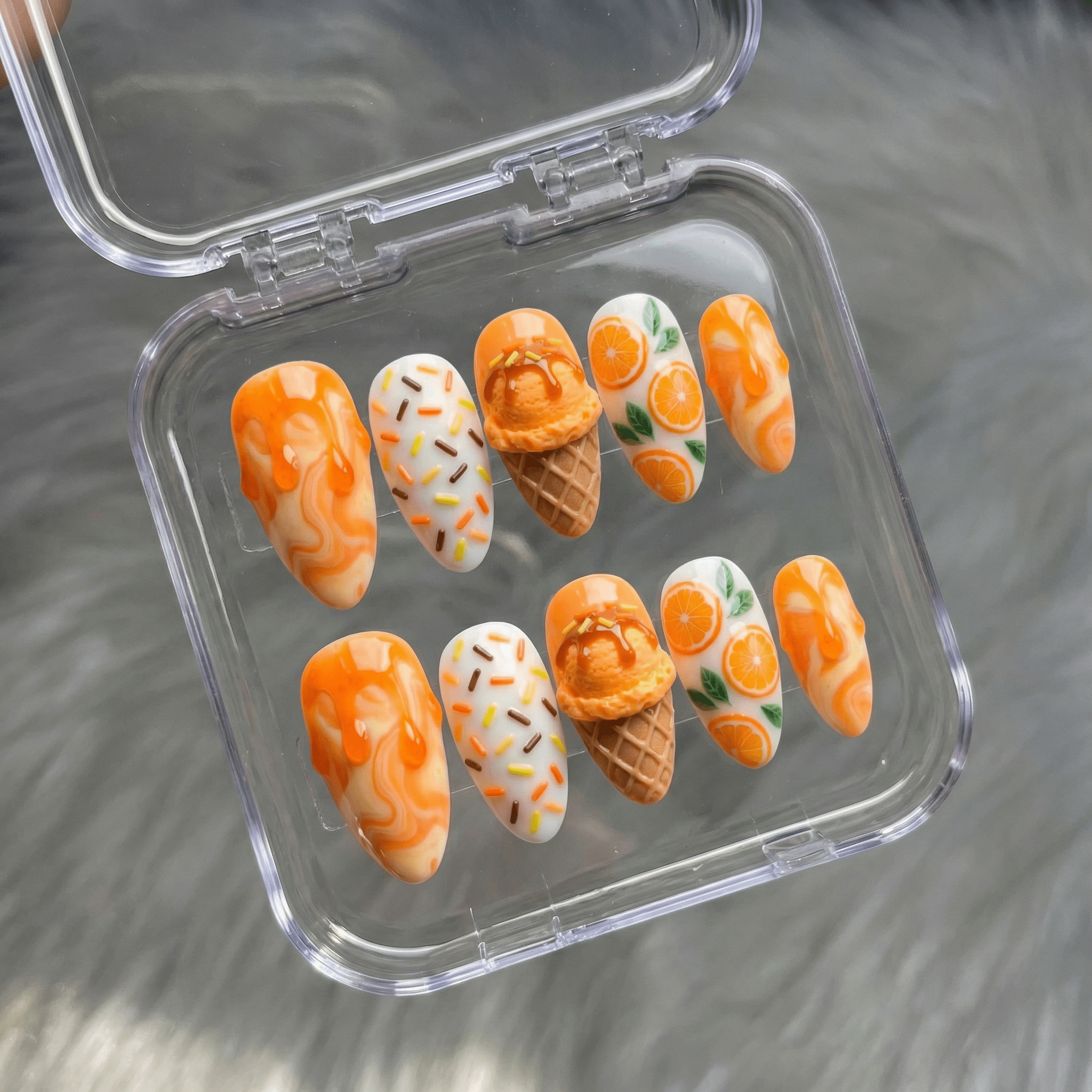 Citrus Sundae press-on nails worn on hand – almond shape by Handora