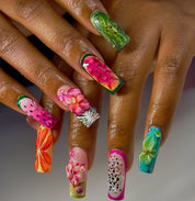 Citrus Zest press-on nails worn on hand – almond shape by Handora