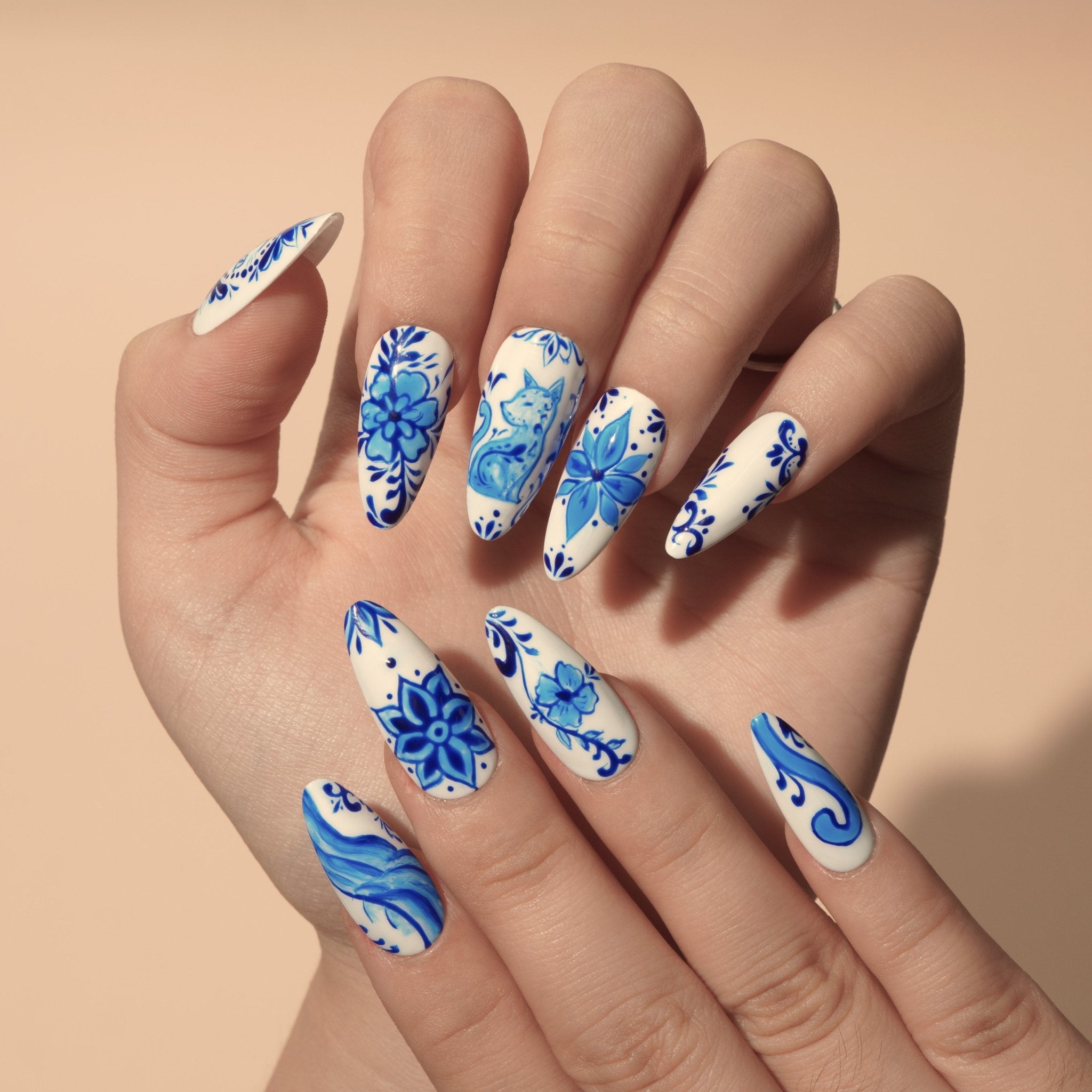 Cobalt Cat almond press-on nails – design close-up by Handora