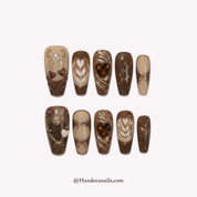 Cocoa Kisses press-on nails – hand-painted reusable gel set by Handora