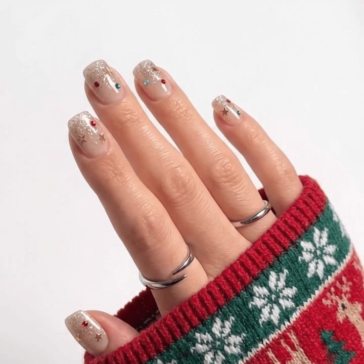 Confetti Noel Christmas press-on nails - moving hand by Handora Nails