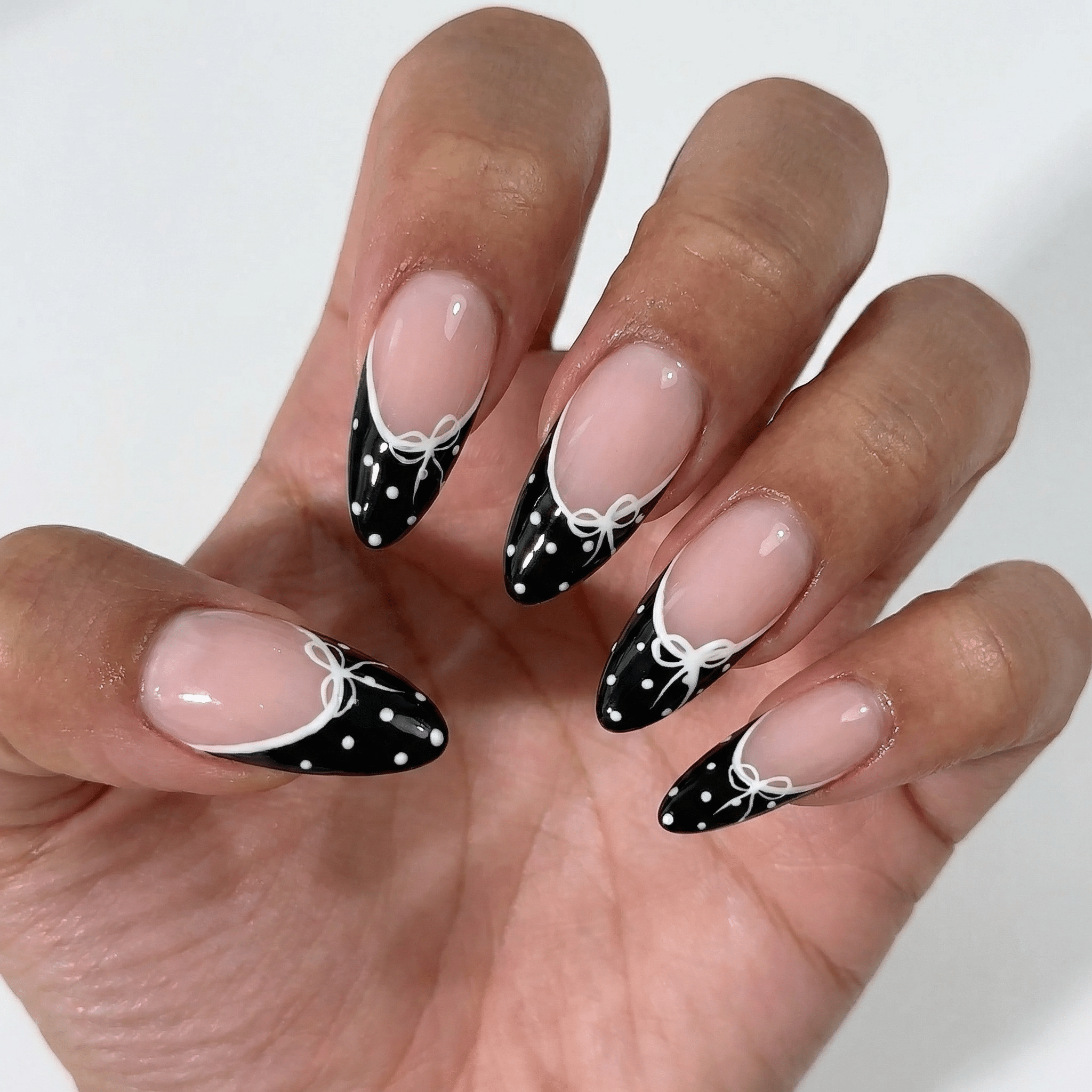 Coquette Bow press-on nails – hand-painted reusable gel set by Handora