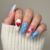 Coquette Charms press-on nails – hand-painted reusable gel set by Handora