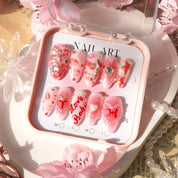 Coquette Kiss press-on nails – hand-painted reusable gel set by Handora