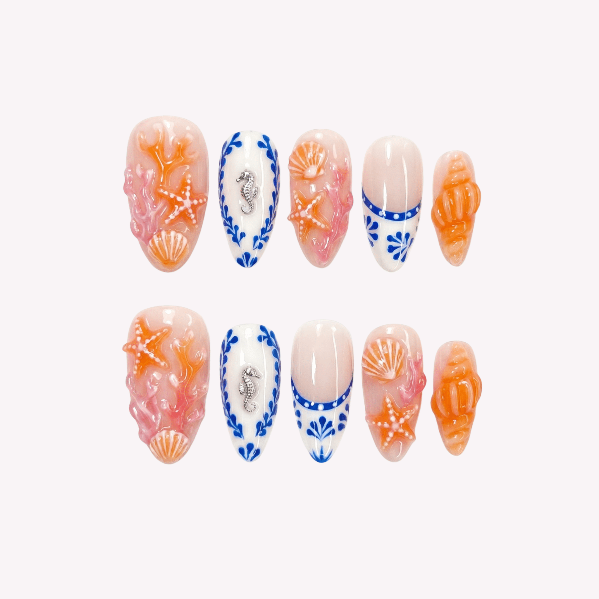Coral Charm almond press-on nails by Handora