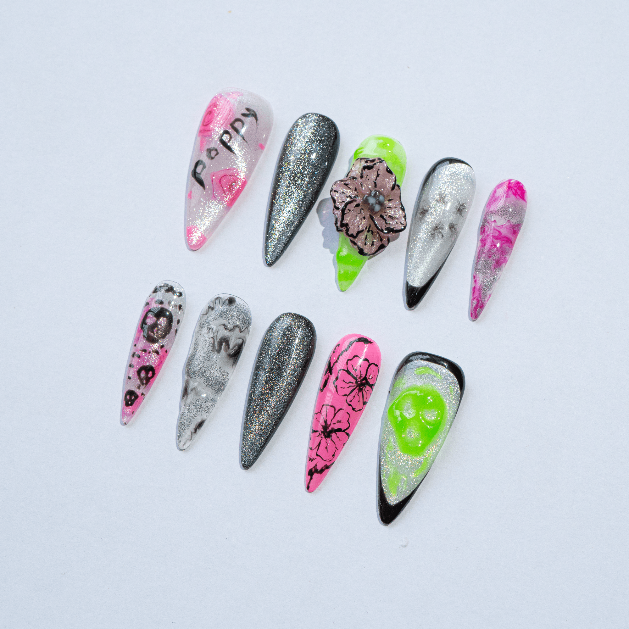 Cosmic Bloom floral nail design – handmade press-on nails by Handora