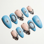 Cosmic Dew press-on nails worn on hand – almond shape by Handora