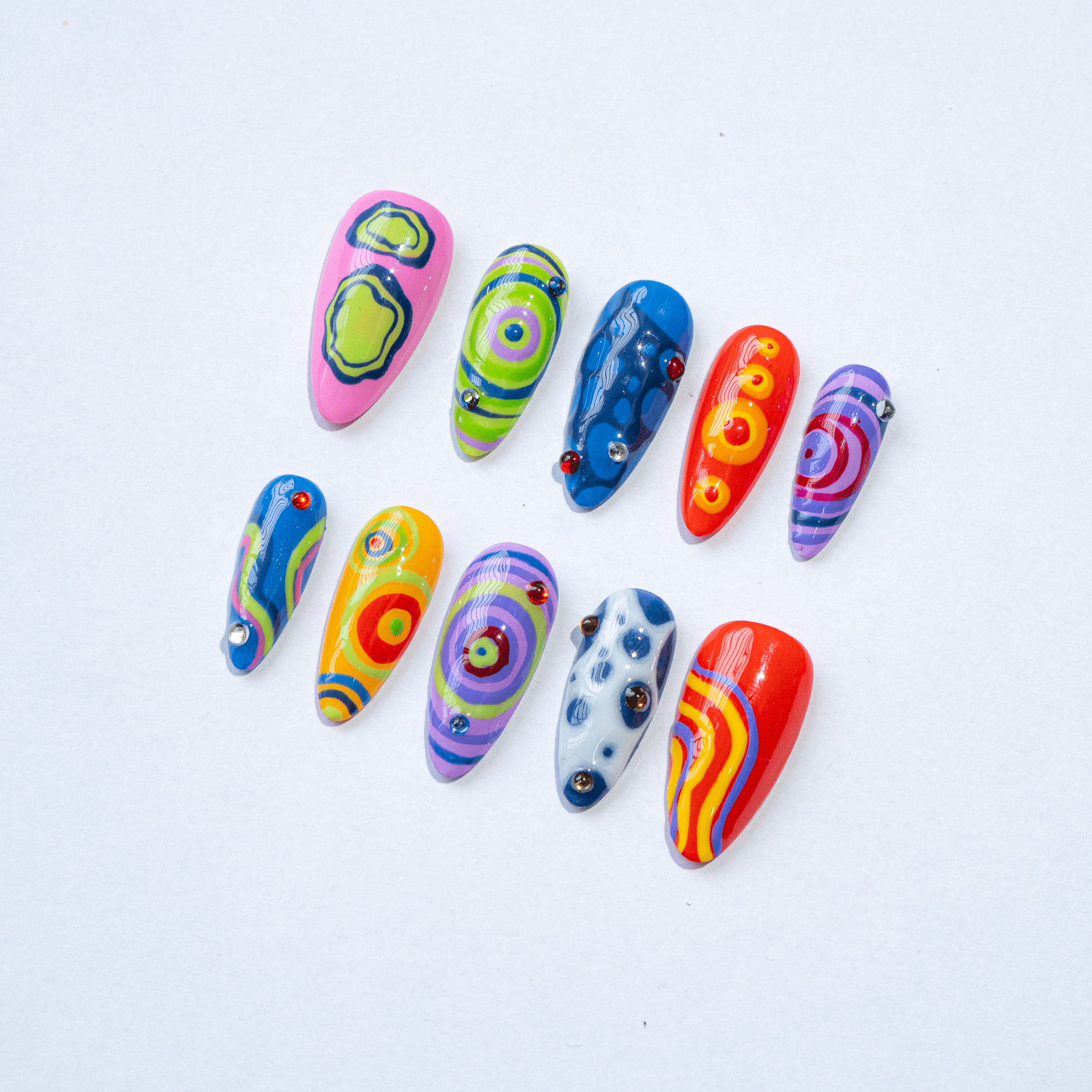 Cosmic Swirls crystal nail design – handmade press-on nails by Handora