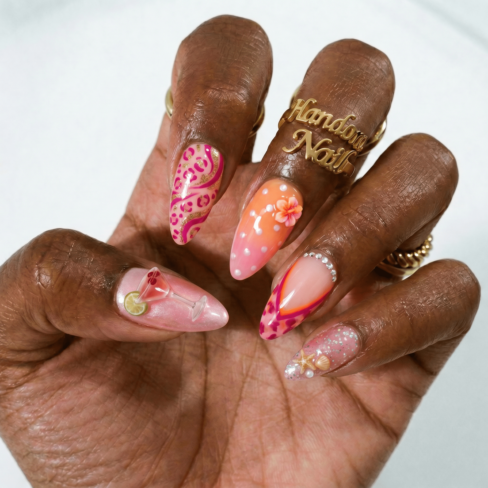 Cosmopolitan press-on nails – hand-painted reusable gel set by Handora