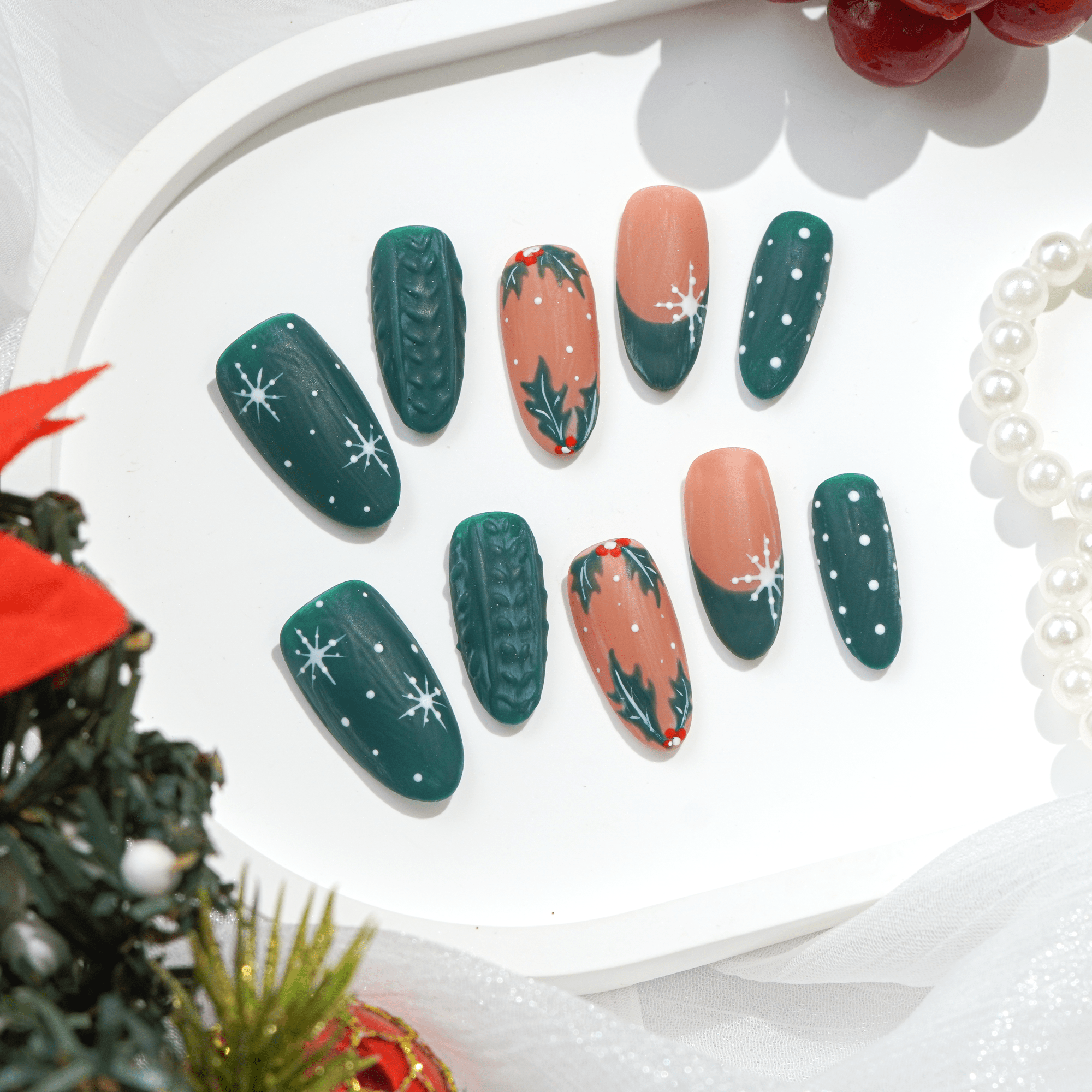 Cozy Emerald press-on nails worn on hand – almond shape by Handora