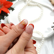 Crimson Joy press-on nails – hand-painted reusable gel set by Handora