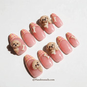 Cuddly Poodle press-on nails worn on hand – almond shape by Handora