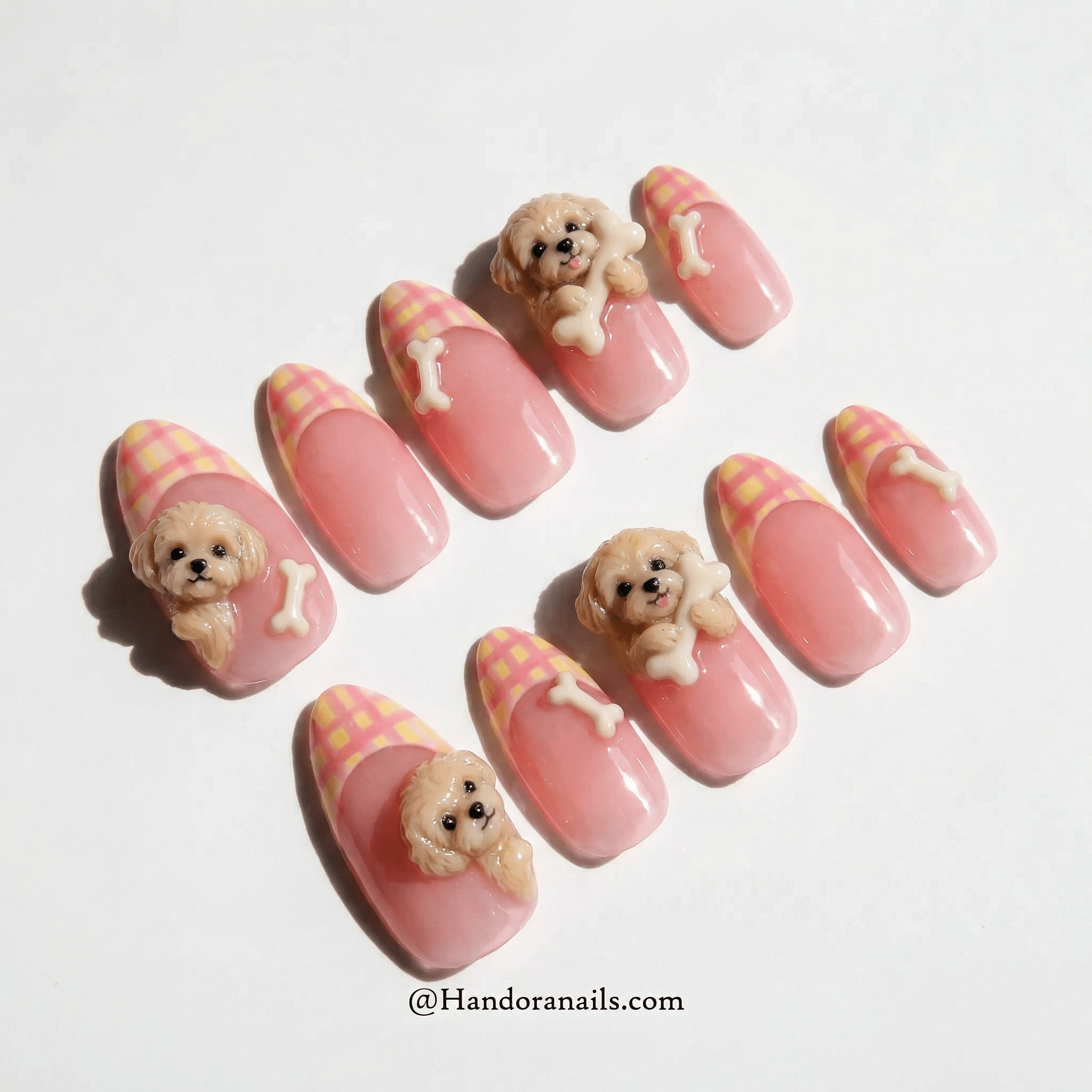 Cuddly Poodle press-on nails worn on hand – almond shape by Handora