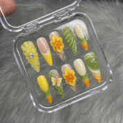 Daffodil Bloom stiletto press-on nails – design close-up by Handora