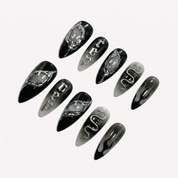Darkest Night press-on nails worn on hand – almond shape by Handora