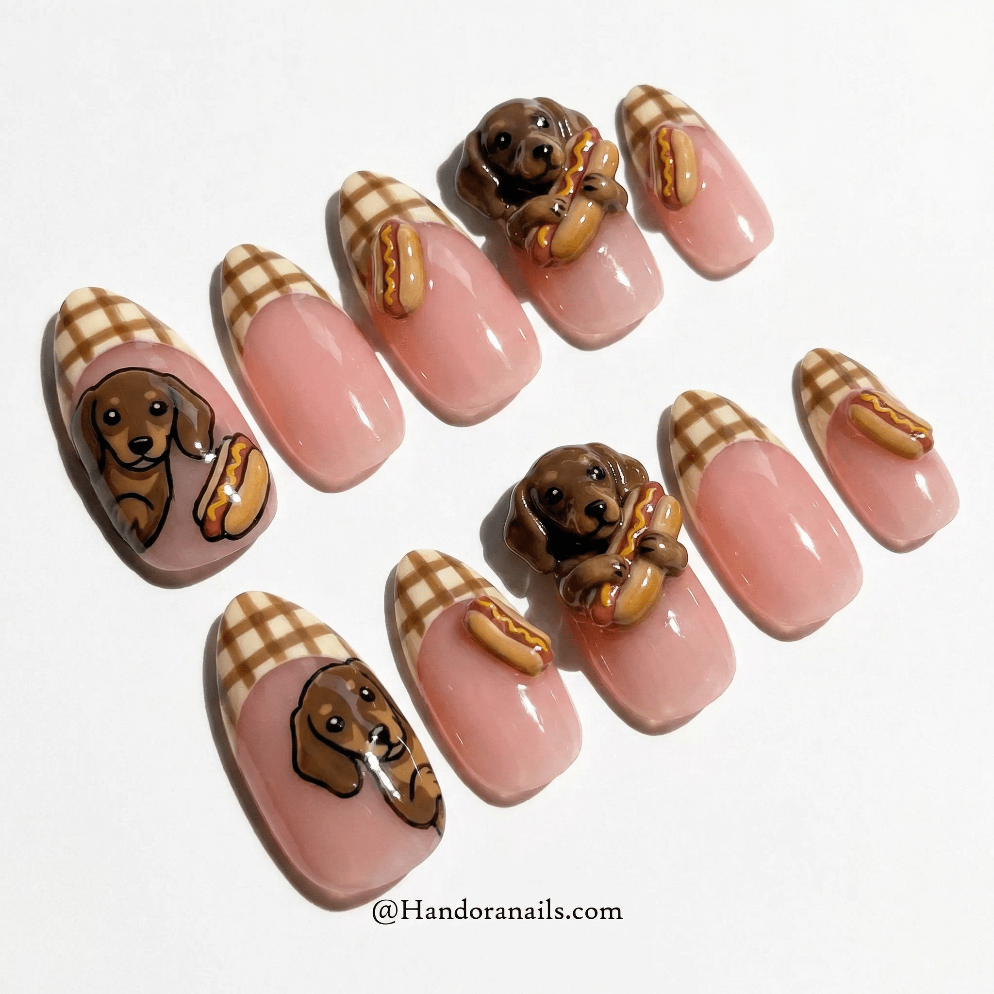Doxie Hotdog press-on nails worn on hand – almond shape by Handora