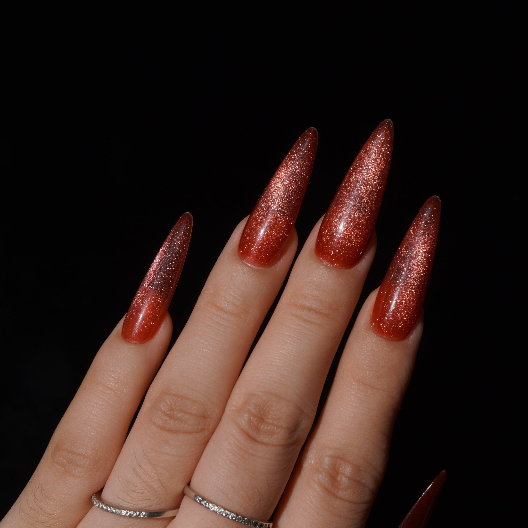 Emberglow press-on nails – hand-painted reusable gel set by Handora