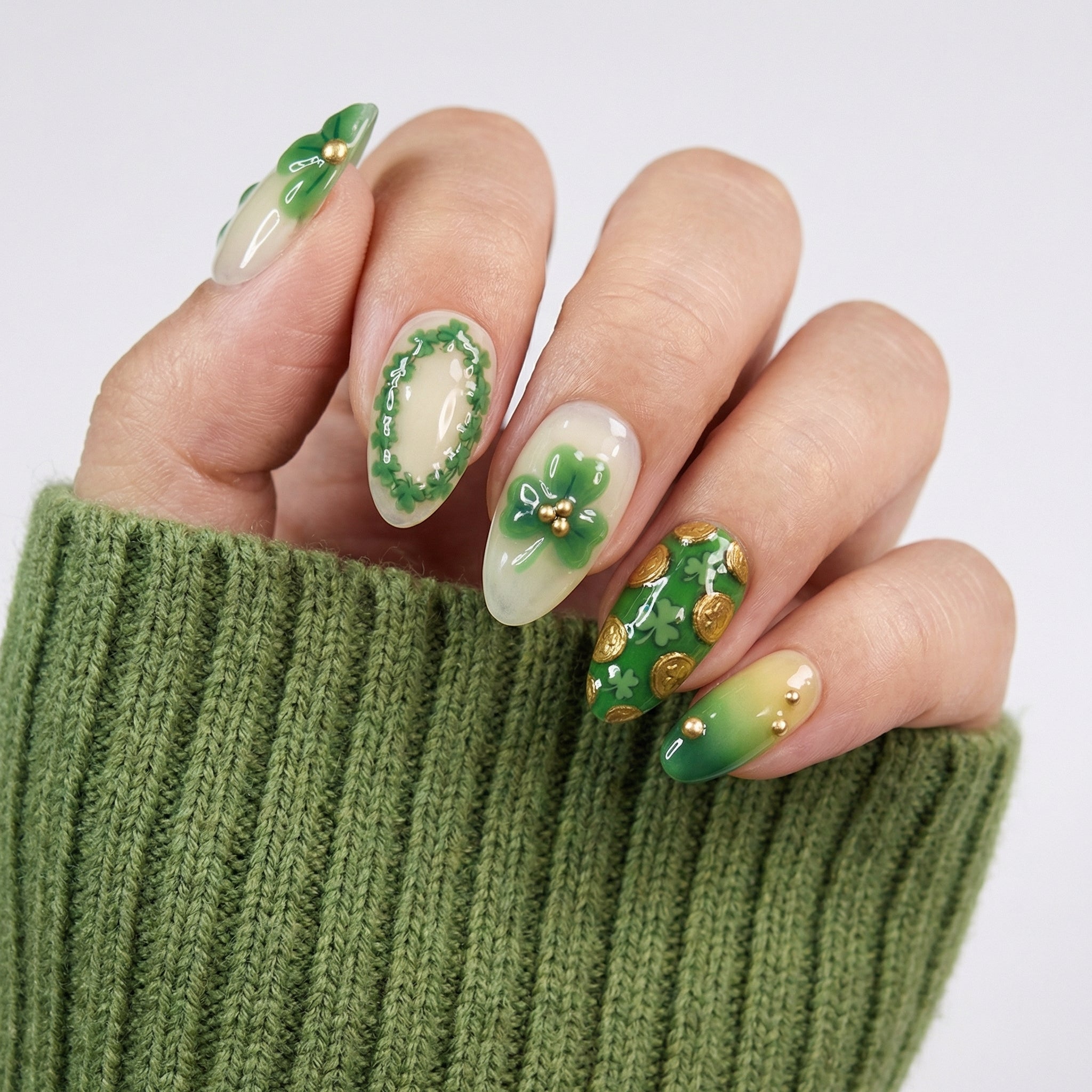 Emerald Clovers press-on nails – hand-painted reusable gel set by Handora