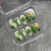 Emerald Clovers press-on nails – design close-up by Handora