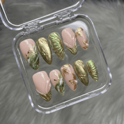 Emerald Gilded almond press-on nails – design close-up by Handora