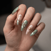 Ethereal Taurus press-on nails – hand-painted reusable gel set by Handora