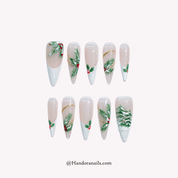 Festive Holly almond press-on nails by Handora