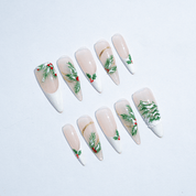 Festive Holly almond press-on nails – design close-up by Handora