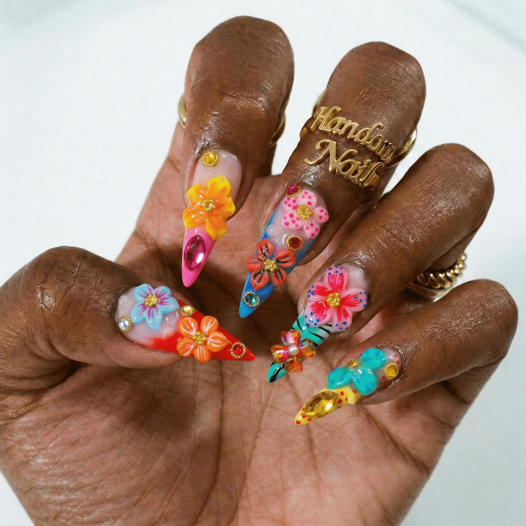 Floral Carnival press-on nails – hand-painted reusable gel set by Handora