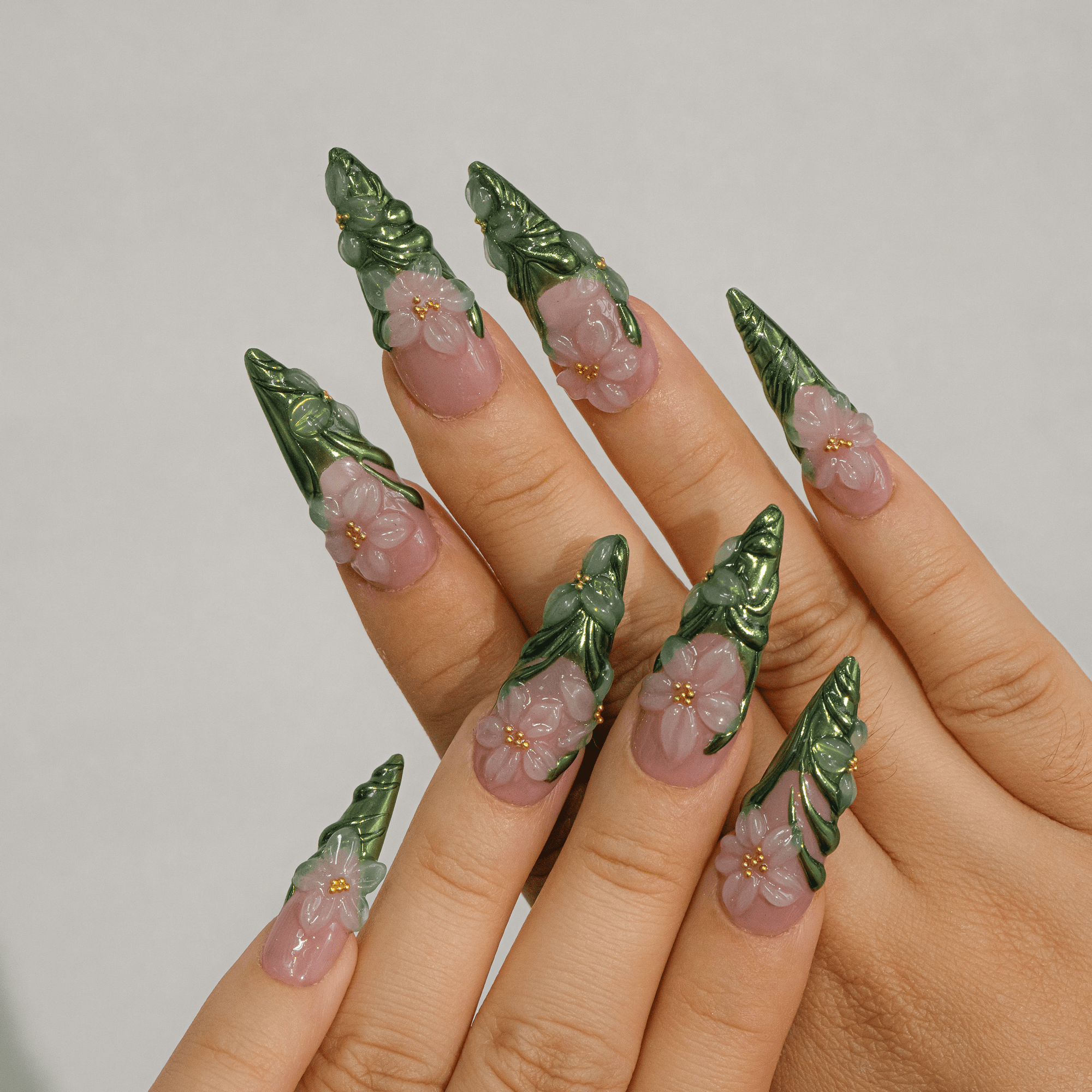 Floral Ceramic stiletto press-on nails – design close-up by Handora