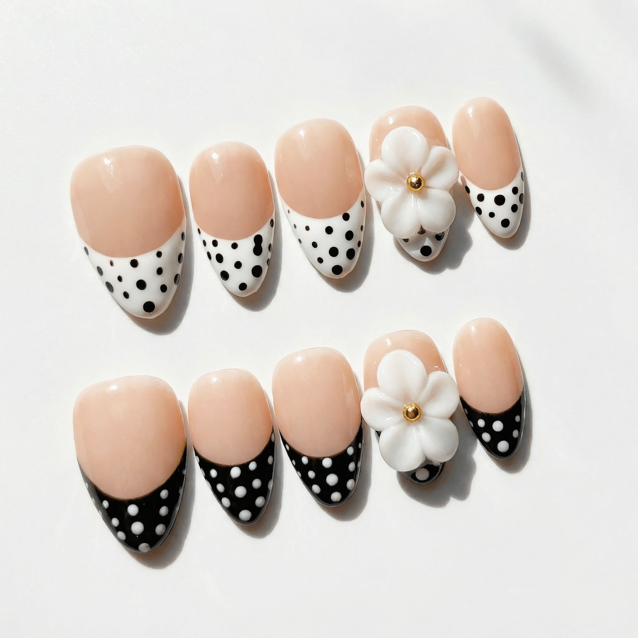 Floral Charm almond press-on nails – design close-up by Handora