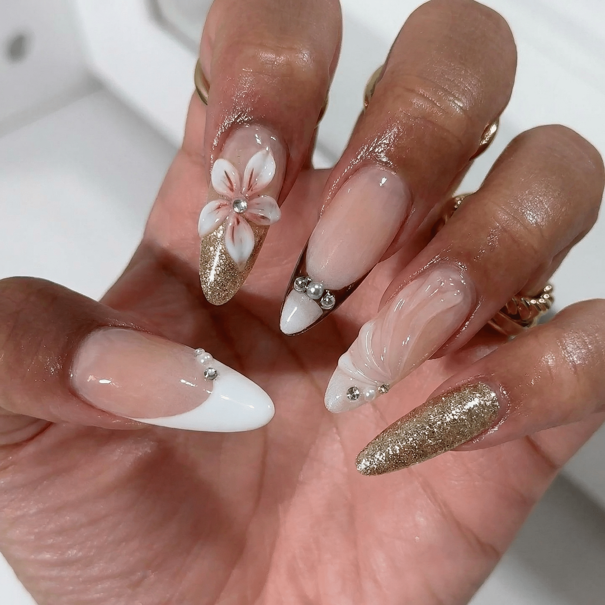 Floral Elegance almond press-on nails – design close-up by Handora