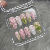 Floral Grace almond press-on nails – design close-up by Handora