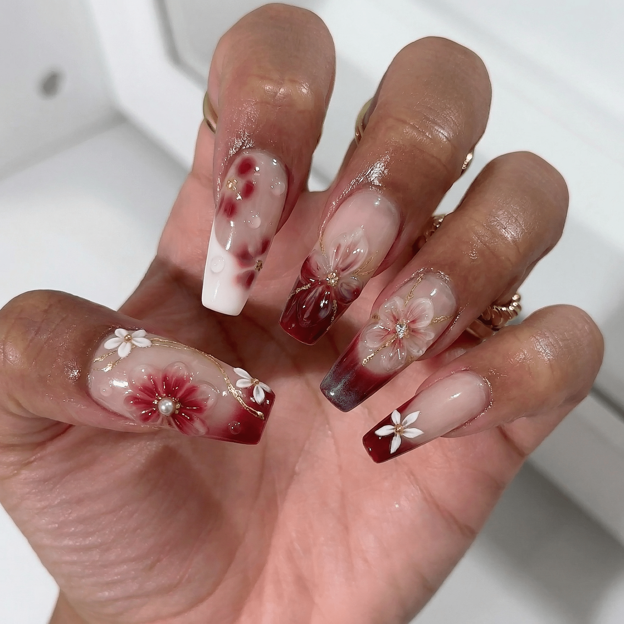 Floral Marble press-on nails – hand-painted reusable gel set by Handora